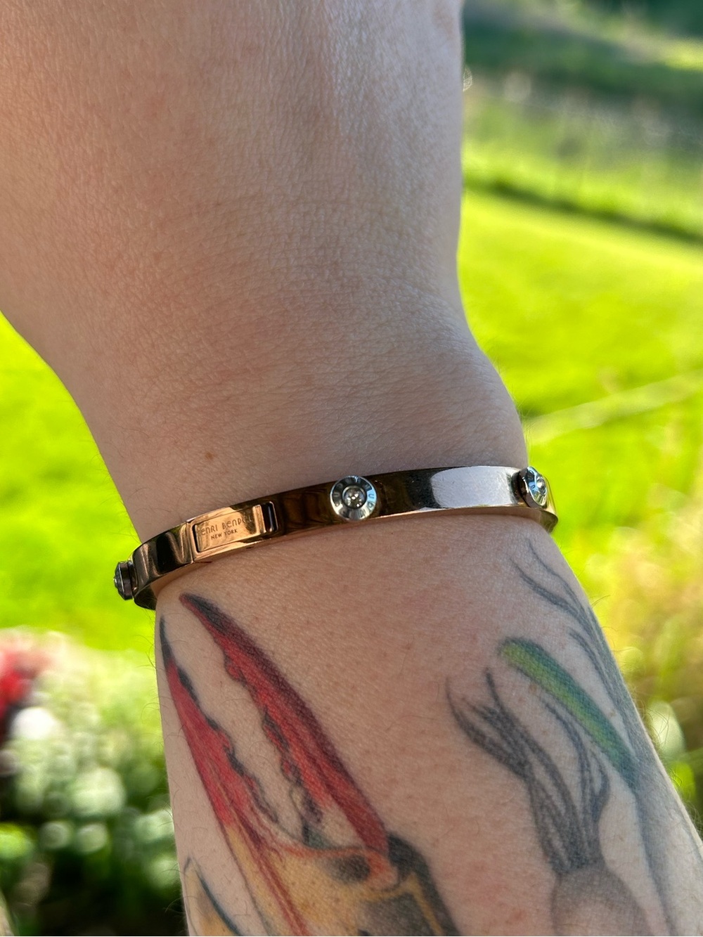 Henri Bendel Bronze Tone Rhinestone Hinge Bangle Bracelet